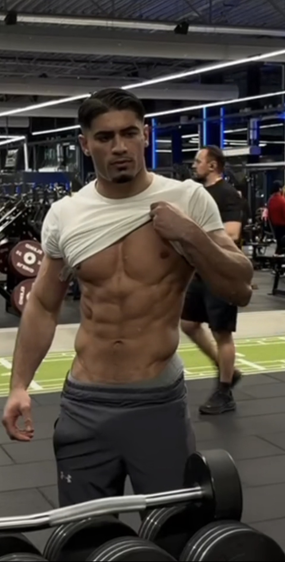 Loaded barbell on a gym platform